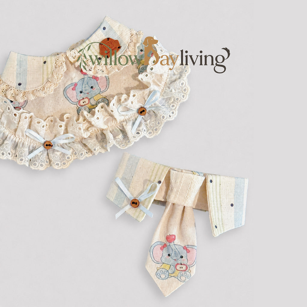 Cream Elephant Charm Bib