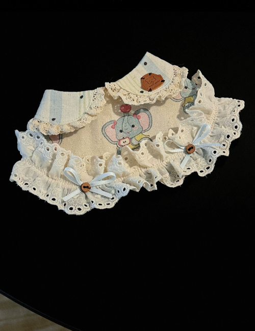Cream Elephant Charm Bib