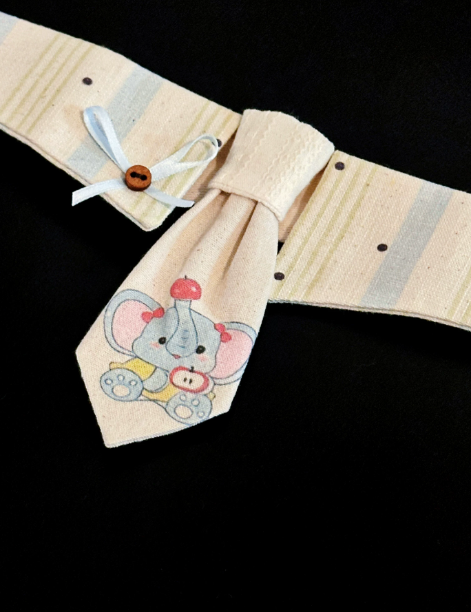 Cream Elephant Charm Bib